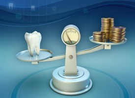 Tooth and coins on balance scale