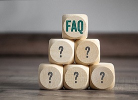 Pyramid of wooden FAQ blocks