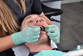 Man receiving dental treatment