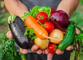 Man holding vegetables