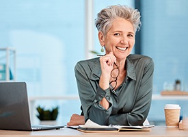 Woman smiling at an office