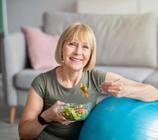 Woman eating a salad in Pittsburgh