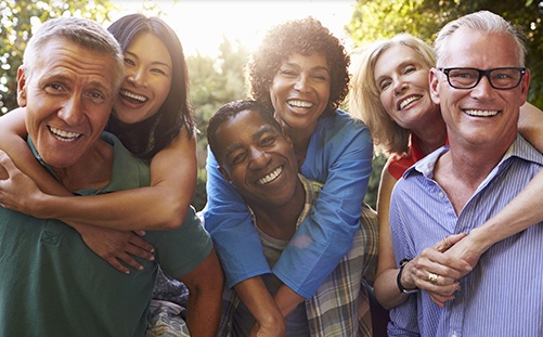 Smiling family outdoors