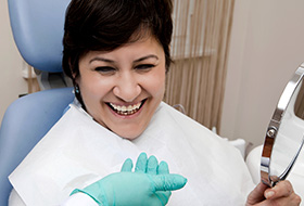 Smiling woman in dental chair