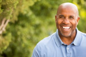 older man smiling nice teeth