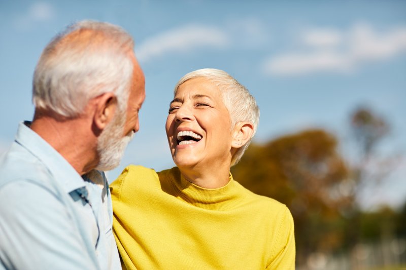 older couple smiling and laughing together