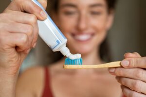 Woman brushing her teeth